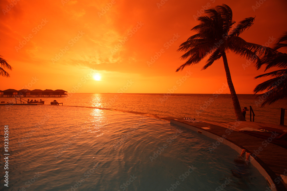 Sunset over the swimming pool, Filitheyo island, Maldives