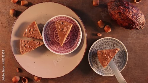 Serving nutella, hazelnut cake. Chocolate dessert.