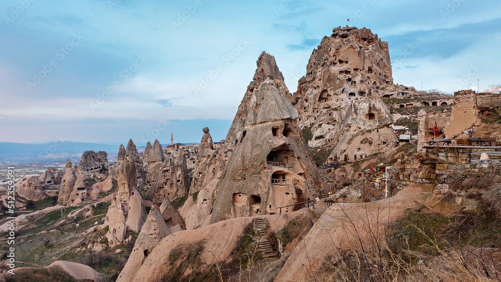 View of the city and Ortahisar castle, old houses in the rocks. Cappadocia. province of Nevsehir. Turkey