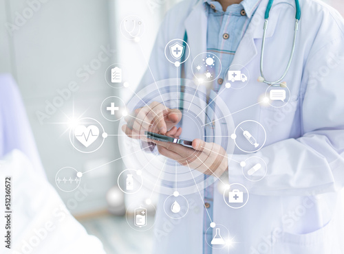 Fototapeta Naklejka Na Ścianę i Meble -  Doctor hand touching smartphone for connection with modern virtual screen interface, medical technology or Telemedicine