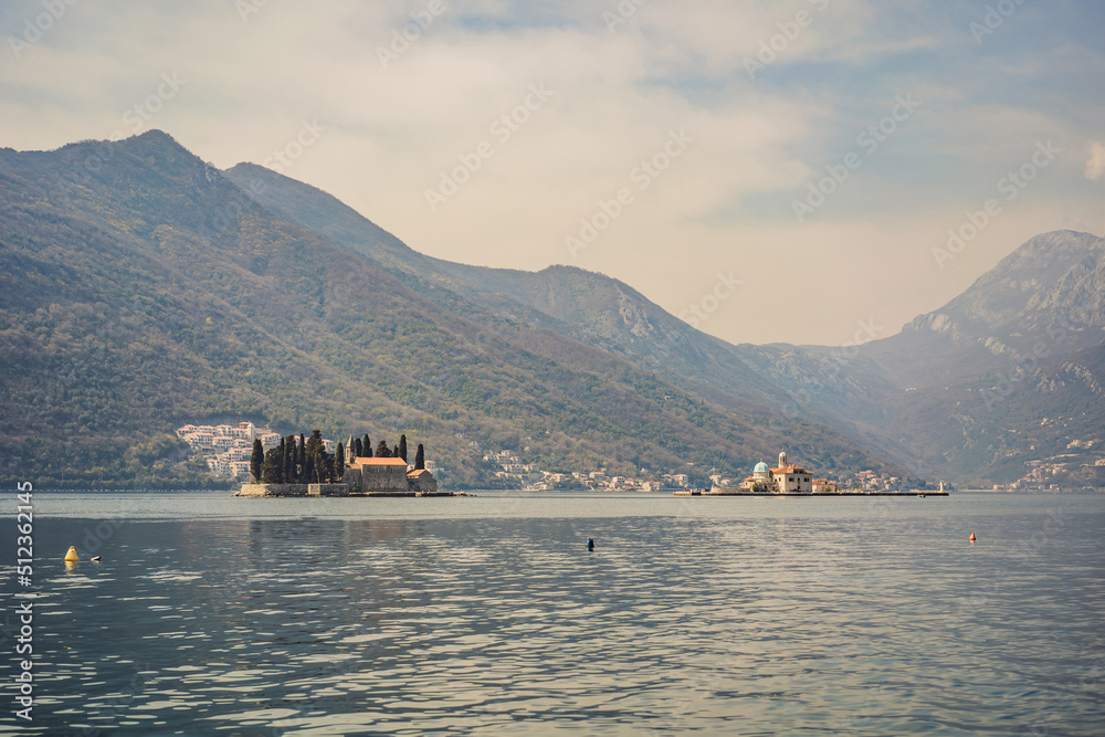 St George Island in the Bay of Kotor at Perast in Montenegro, with St George Benedictine Monastery. St. George Island, is a small natural island off the coast of Perast in Bay of Kotor, Montenegro