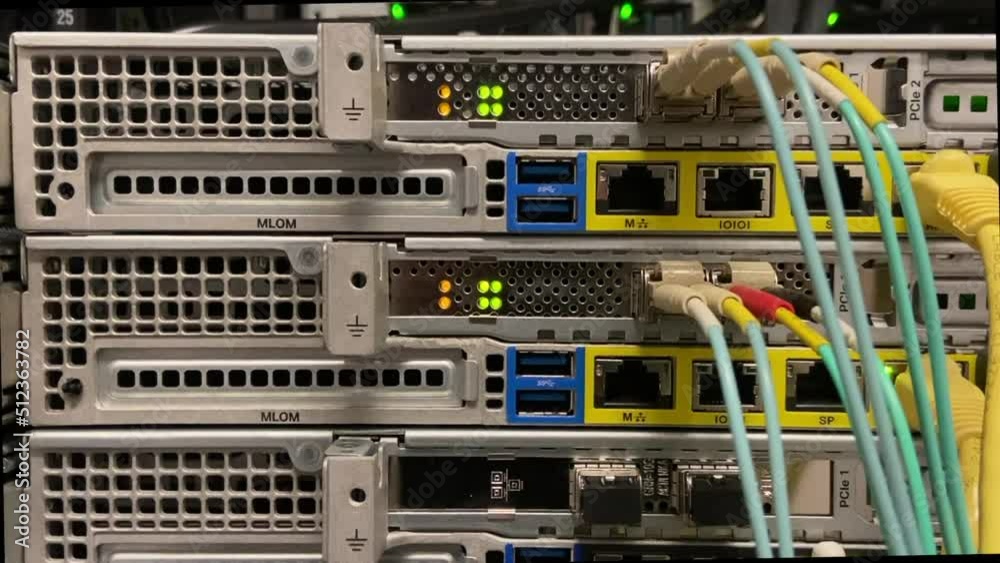 Sever equipment with blinking lights working in a data center Sever equipment with blinking lights working in a data center