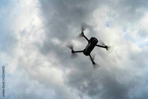 Drone flying over sky background