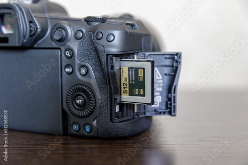 Camera with open CFexpress card slot