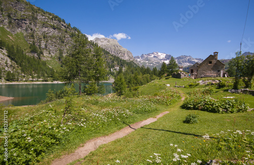 Amazing view of Devero lake or Codelago with little alpine village in Piedmont Italy photo