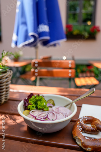 Bayrischer Wurstsalat im schönen Biergartenn photo