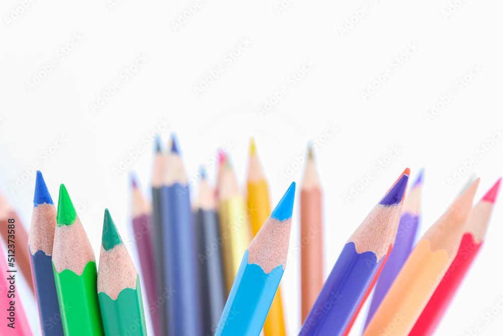 colored pencils lined on a white background colored pencils lined on a white background