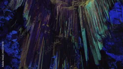 Stalactites in St. Michael's cave in Gibraltar lit by blue light.