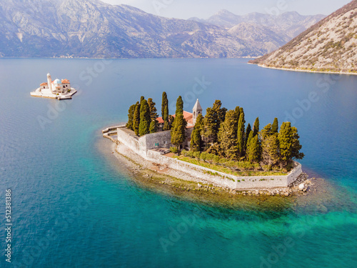 Aerophotography. View from flying drone. St George Island in the Bay of Kotor at Perast in Montenegro, with St George Benedictine Monastery. St. George Island, is a small natural island off the coast