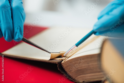 Obraz na plátne Antique Book Restoration