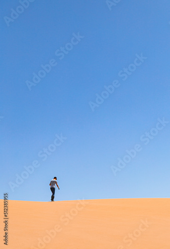 person on the sand dune