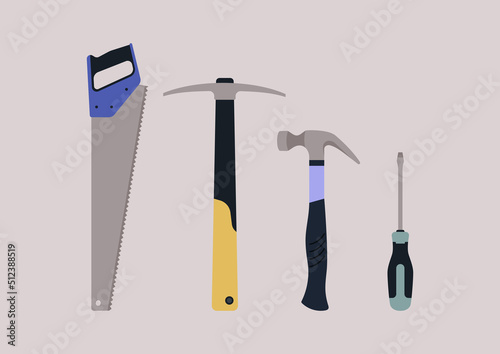 A hardware toolkit, a picker, a handsaw, a hammer, and a screwdriver
