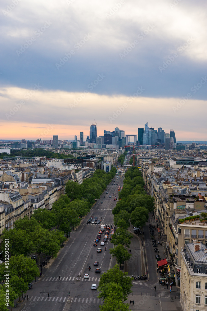 Views from above of the streets of Paris at sunset.