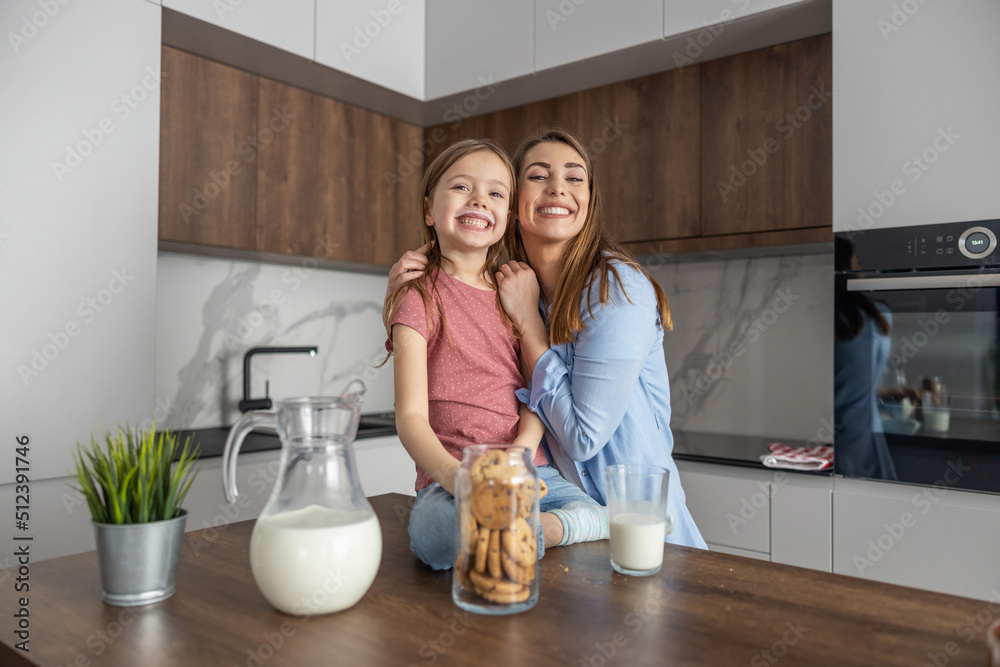 Mother and daughter have breakfast at home Mother and daughter have breakfast at home