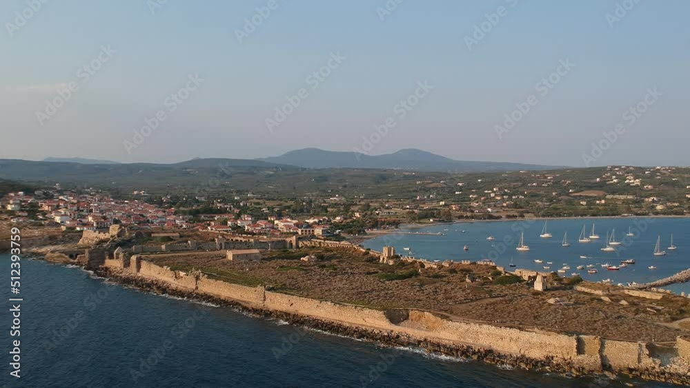 Aerial view over Methoni Castle and the fortified city. Its one of the most important and the biggest in castle in Mediterranean sea, a must-visit place in Greece located in Methoni, Messenia, Greece Aerial view over Methoni Castle and the fortified city. Its one of the most important and the biggest in castle in Mediterranean sea, a must-visit place in Greece located in Methoni, Messenia, Greece