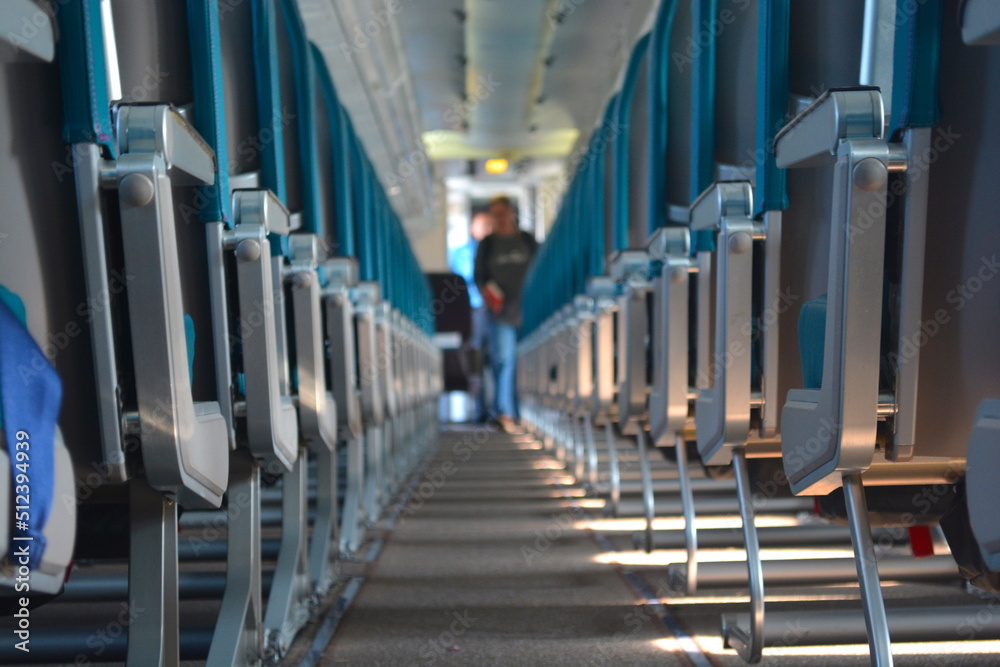 Fototapeta premium Airplane aisle during boarding