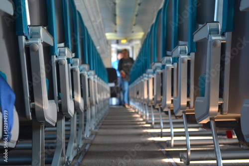 Airplane aisle during boarding