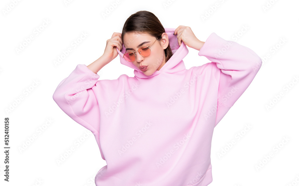 Fashion woman pouting lips in casual pink hoodie isolated on white Fashion woman pouting lips in casual pink hoodie isolated on white