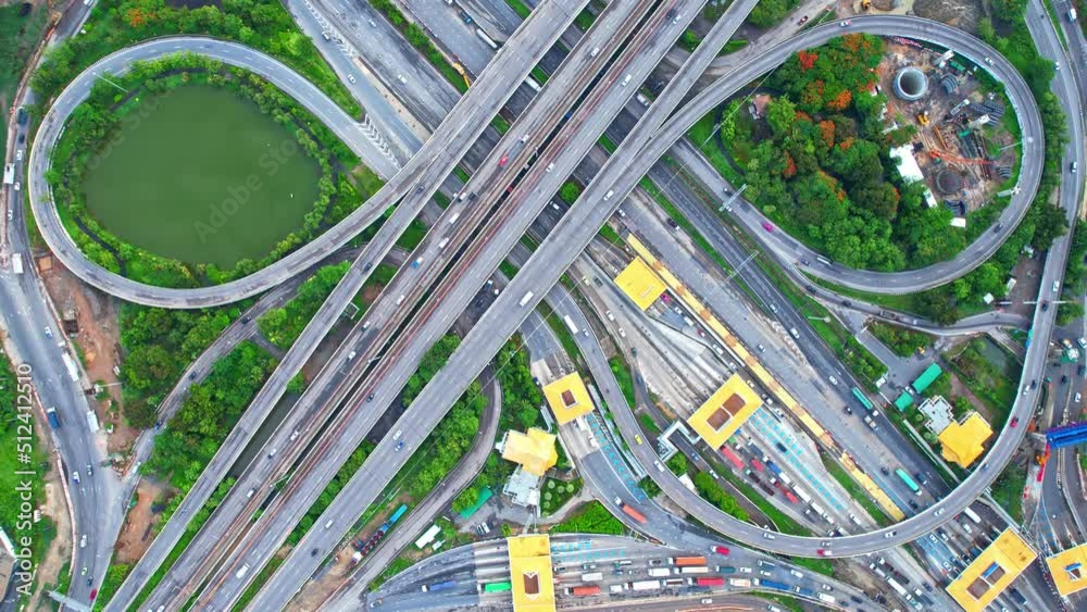 4K : Top view of Highway road junctions. The Intersection freeway. outer ring road. Aerial view from a drone. Nonthaburi, thailand. Drone footage.
4K : Top view of Highway road junctions. The Intersection freeway. outer ring road. Aerial view from a drone. Nonthaburi, thailand. Drone footage.