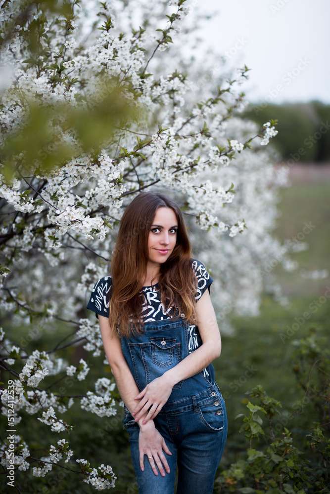 Vinnytsia, Ukraine. May 18, 2022. Portrait of a girl in bloom in the spring Vinnytsia, Ukraine. May 18, 2022. Portrait of a girl in bloom in the spring