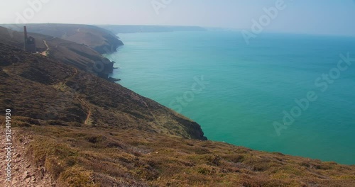 Stunning Views Of Chapel Porth Beach With Wheal Coates Tin Mine At Background In North Cornwall, England, UK. Panning Left photo