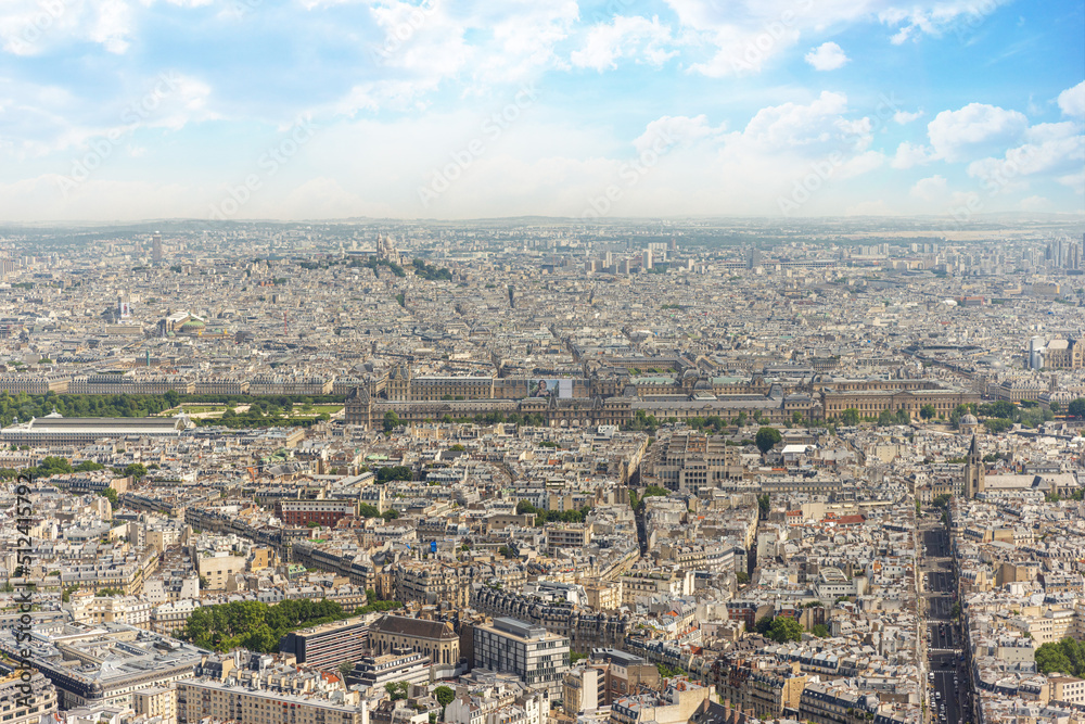 Aerial city view of Paris with the Louvre in the center