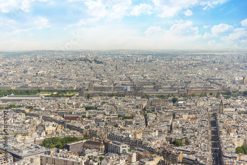 Aerial city view of Paris with the Louvre in the center © Picturellarious