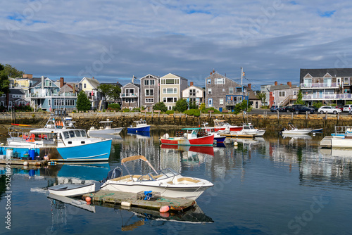 Rockport - A sunny Autumn morning view of colorful fishing boats docking in the peaceful inner harbor of Rockport, a small seaside resort town at tip of Cape Ann, near Boston, Massachusetts, USA. © Sean Xu