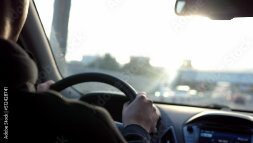 Wallpaper Mural Man driving a car while driving. Torontodigital.ca