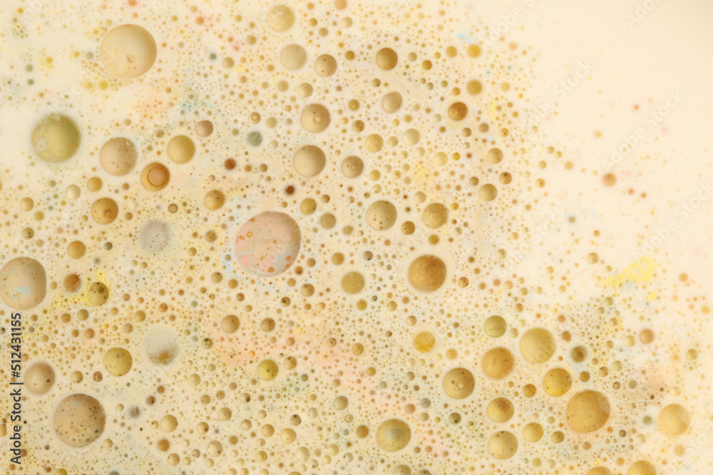 Abstract beige and gold bubble blot and drops background. Marble texture. Acrylic color in water and oil. Abstract beige and gold bubble blot and drops background. Marble texture. Acrylic color in water and oil.
