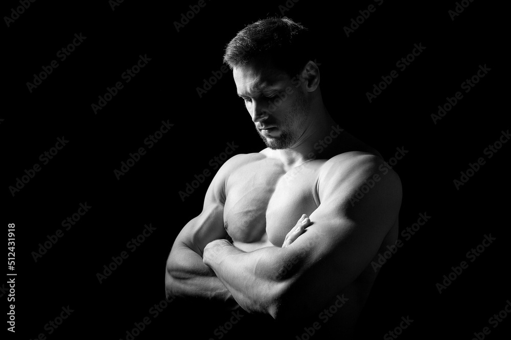 Muscular and sexy torso of young man having perfect abs, bicep and chest. Male hunk with athletic body. Fitness concept. Muscular and sexy torso of young man having perfect abs, bicep and chest. Male hunk with athletic body. Fitness concept.