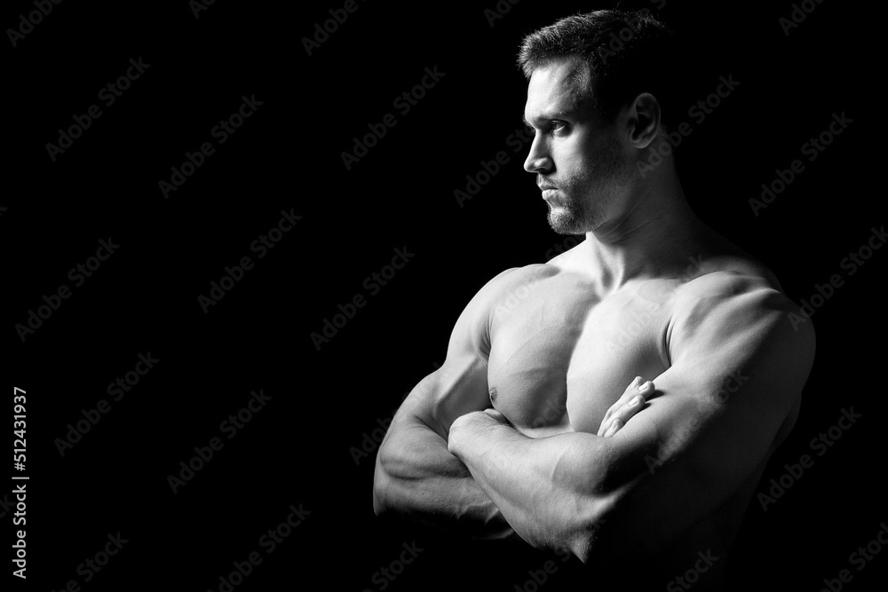 Muscular and sexy torso of young man having perfect abs, bicep and chest. Male hunk with athletic body. Fitness concept. Muscular and sexy torso of young man having perfect abs, bicep and chest. Male hunk with athletic body. Fitness concept.