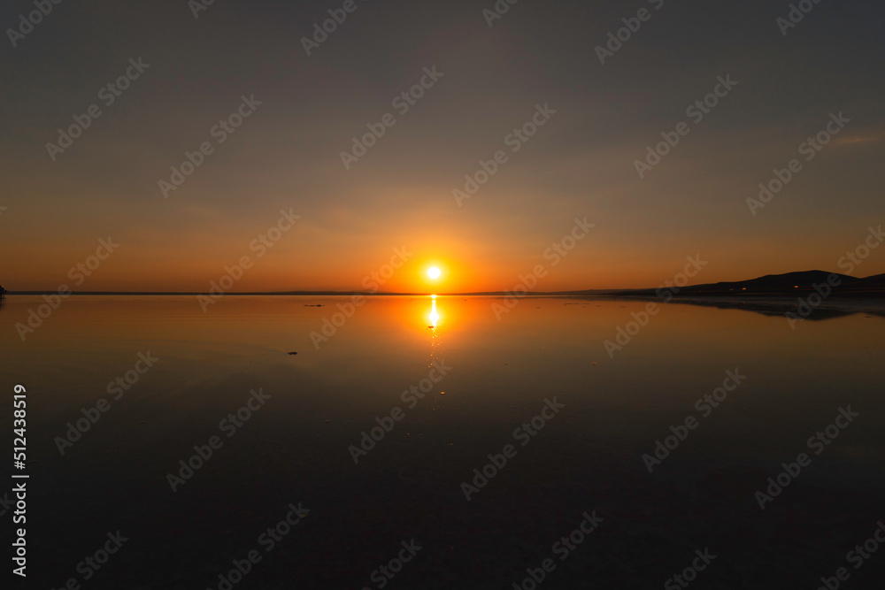 Sunset over the lake. Religion or quote or nature or sunset background photo