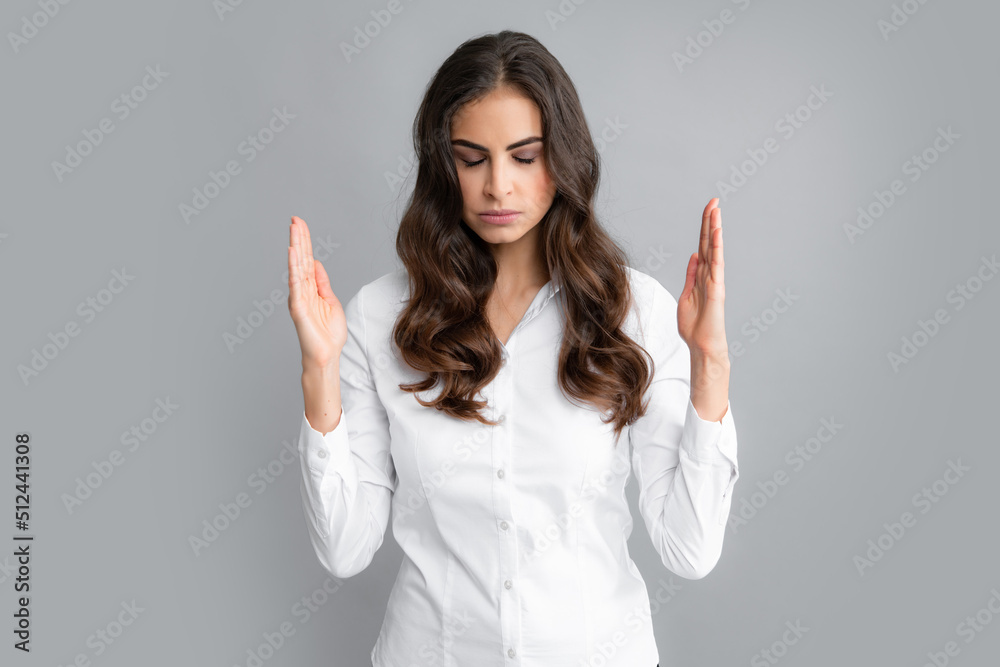 Negative woman crossed hands show no decline forbidden rule isolated over gray background. Displeased angry woman blocking offer, showing cross stop gesture, negative reply. Negative woman crossed hands show no decline forbidden rule isolated over gray background. Displeased angry woman blocking offer, showing cross stop gesture, negative reply.