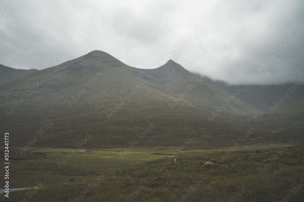 Fototapeta premium Mists rolling over large mountains