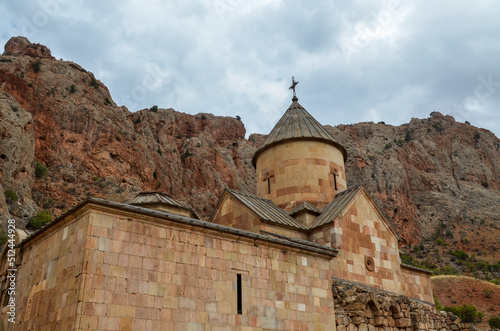 Medieval monastery Noravank situated on the top of the rocks is surrounded Caucasian Mountains of Armenia