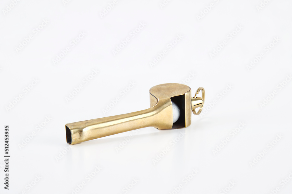 Classic Whistle for Policeman and Referee, Coach Whistle, White Isolated, Closeup Classic Whistle for Policeman and Referee, Coach Whistle, White Isolated, Closeup