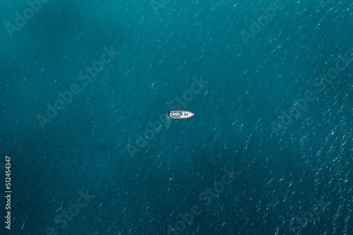 boat in the ocean © Thacher Andreae