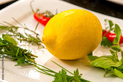  Sicilian lemon on a plate with spices and pepper