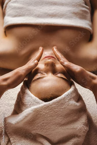 Obraz Close-up of cosmetologist making rejuvenating face procedures for woman client in spa or salon. Cosmetology concept. Aesthetic cosmetology, face care. Girl