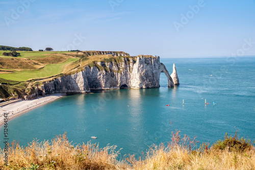 Billede på lærred Etretat Aval cliff, rocks and natural arch landmark and blue ocean