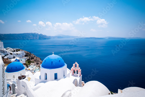 Blue dome church and the Sea in Oia, Santorini, Greece, Aegean Sea.