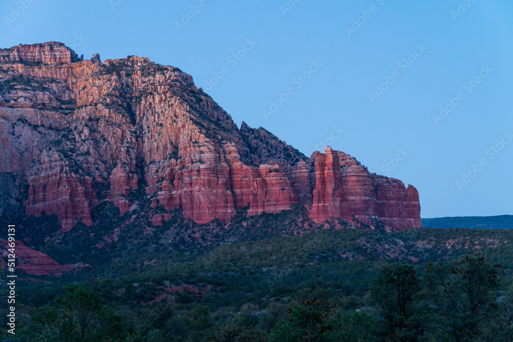 Beautiful red rocks in Sedona, Arizona illuminated at sunset