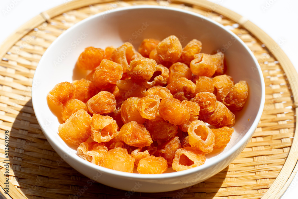 Dried longan on white background. Dried longan on white background.