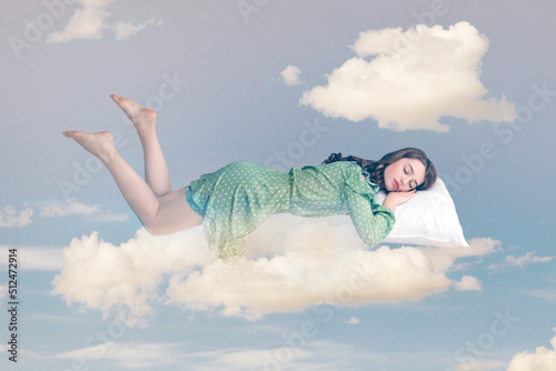Fotografía Relaxed girl in ruffle dress levitating in mid-air, sleeping on stomach lying comfortable cozy on pillow, keeping eyes closed, watching peaceful dream