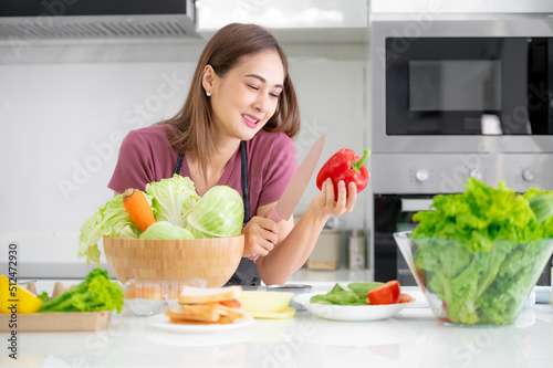 Healthy women cooking salad vegetable eat breakfast