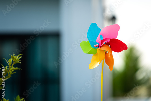 A colorful plastic windmill toy which is install for house decoration. Object photo.
