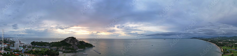 Beautiful panoramic sky and clouds with mountain, Cloudscape, Air clouds in the sunset sky background with the sea and cityscape. Abstract style for text and design.