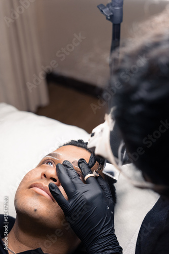 application of micro pigmentation technique on a man s eyebrows
