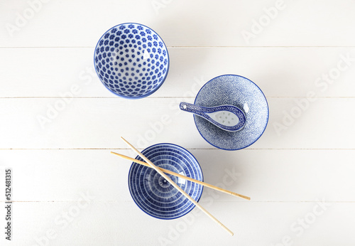 Chinese bowls with chopstic...